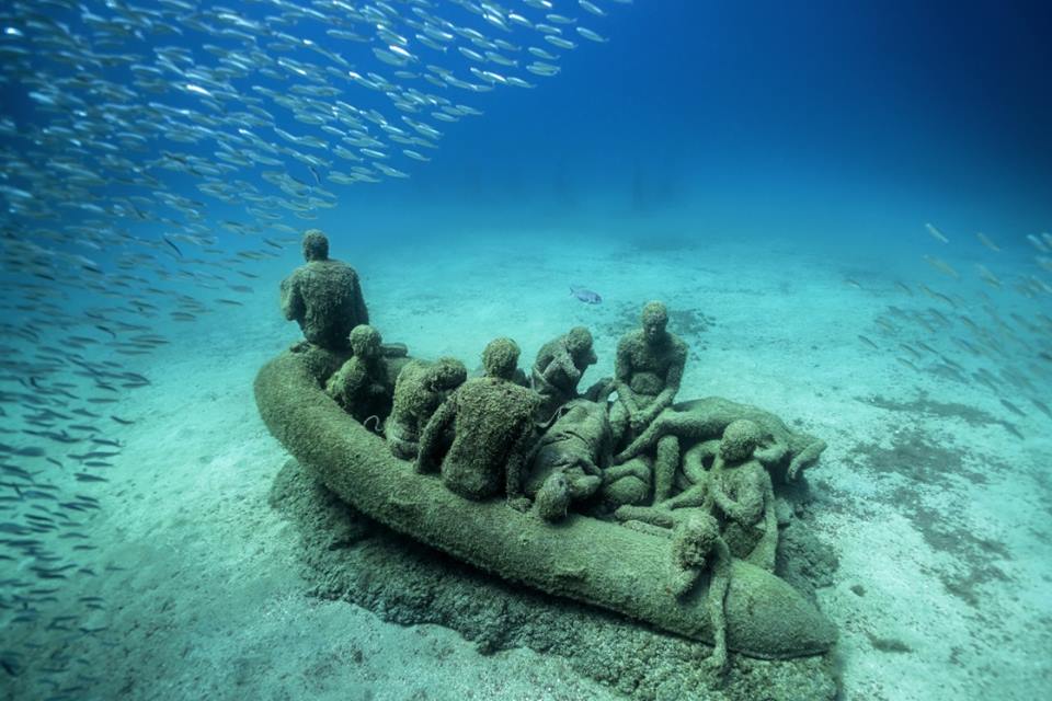 The Raft of Lampedusa with school of sardines.